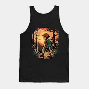 Boy trekking in the woods with a beautiful sunset effect Tank Top